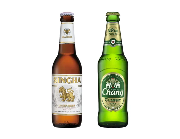 Bières asiatiques Tsingtao Singha Chang Beerlao Asahi Saigon dans restaurant thaïlandais.